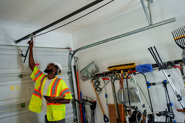 Professional Garage Door Panel Replacement technician working in Newberg, OR